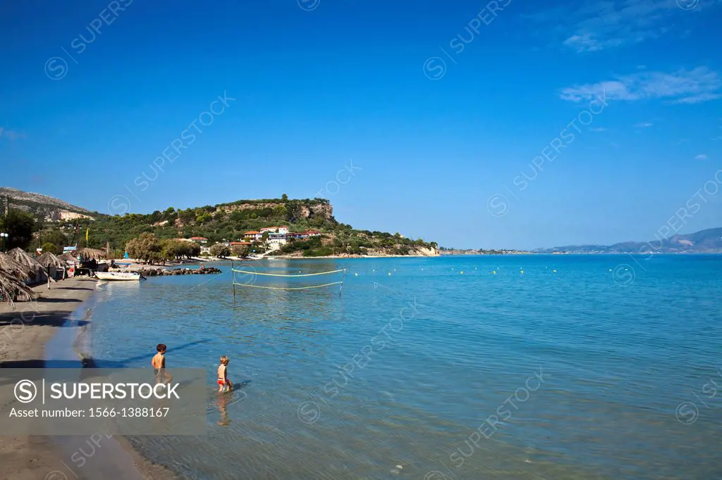 Children Playing In The Sea, Keri Beach, Zakynthos (Zante) Island, Greece.