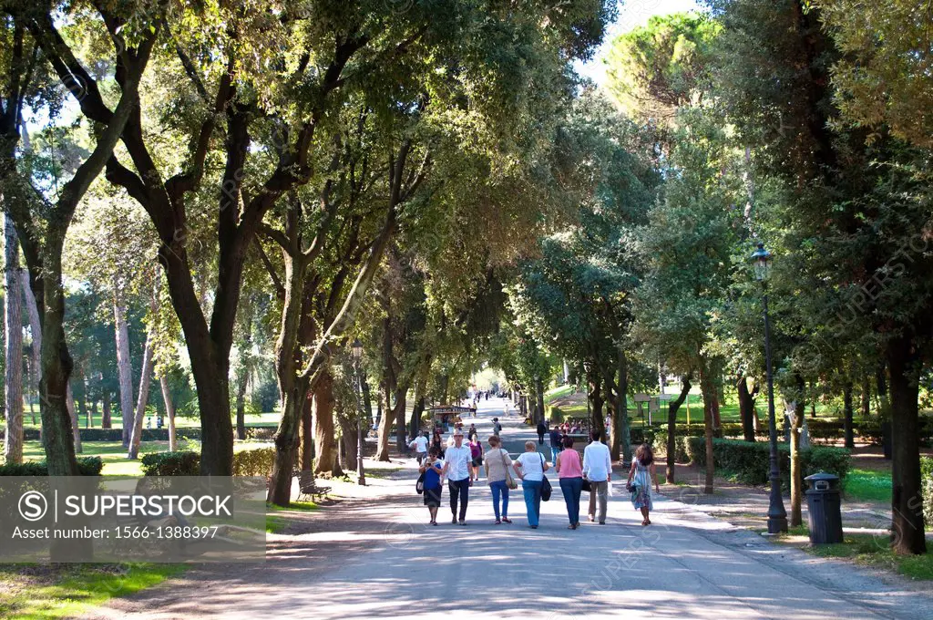 People strolling in Villa Borghese gardens, Rome, Italy.