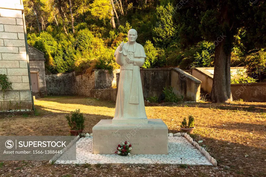 John Paul II sculpture by the church of Saint Nicholas in Racisce, Korcula island, Croatia.