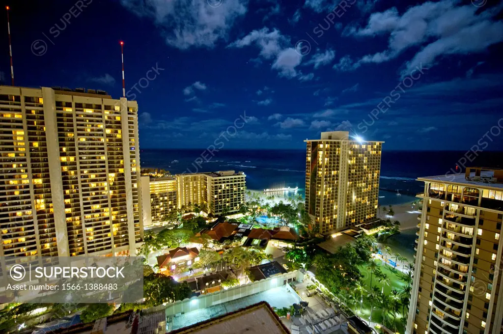 Waikiki tourist area at night, Honolulu, Hawaii.