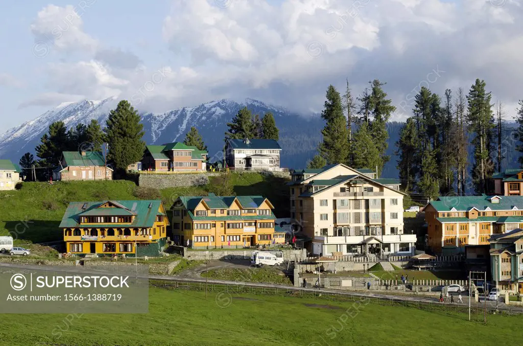 Hotels and Himalayan range, Gulmarg, Jammu & Kashmir, India.