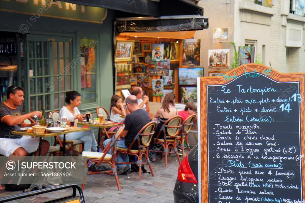 France, Europe, French, Paris, 18th arrondissement, Montmatre, Place du Tertre, restaurant, cafe, brasserie, tables, chairs, customers, alfresco, menu...