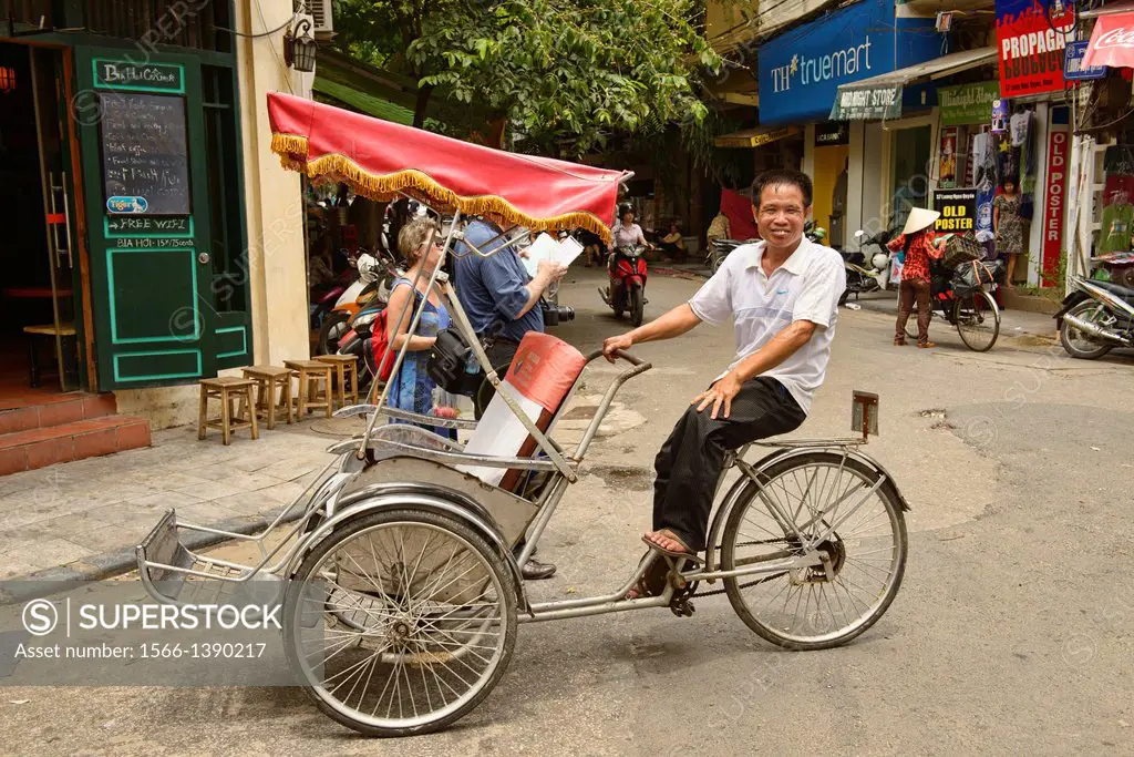 Cyclo driver in Hanoi, Vietnam.