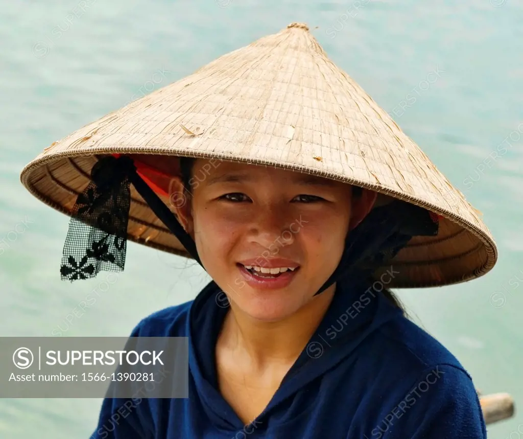 portrait of a boat vendor in Halong Bay, Vietnam.