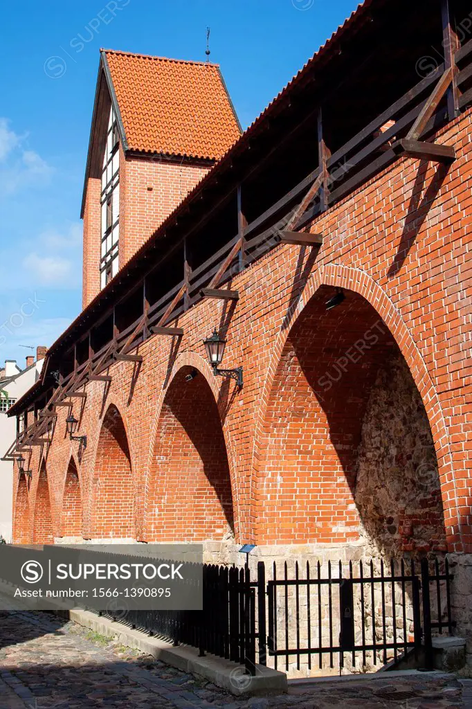 Reconstructed fragment of the city wall and Ramer tower on Torna street, Riga, Latvia.