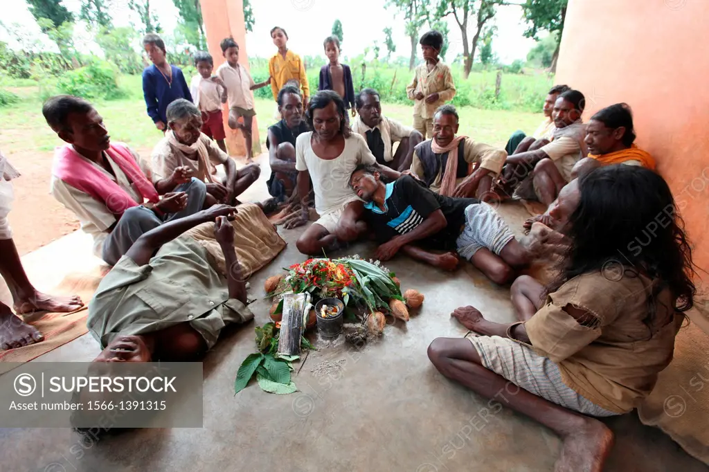 Performing naag Puja on Nagpanchami day. Baiga Tribe, Chada village, Madhya Pradesh, India.
