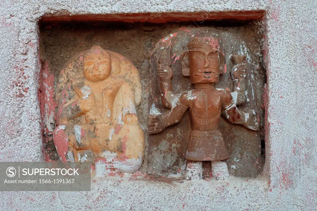 Tribal god statue carved in stone. Madhya Pradesh, India.