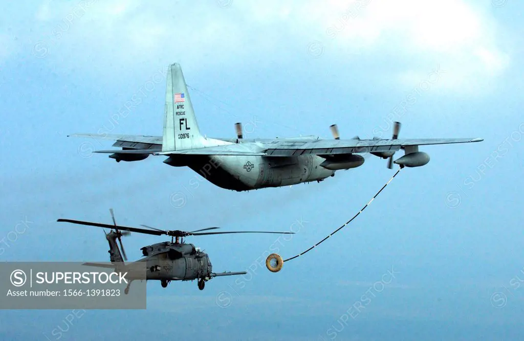 RANDOLPH AIR FORCE BASE, Texas - An Air Force Special Operations Command HC-130P refuels HH-60 Pave Hawk helicopters in the skies over southern Louisi...