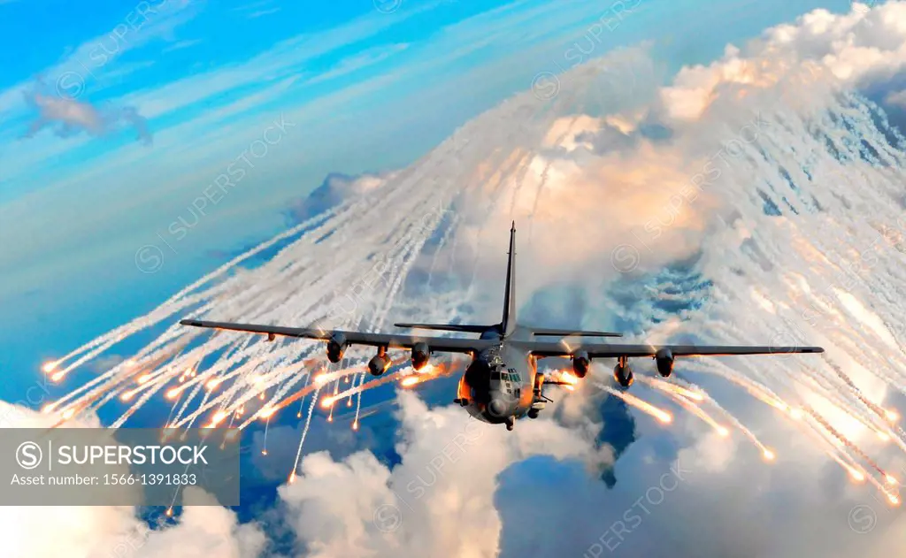 An AC- 130U gunship from the 4th Special Operations Squadron jettisons flares over an area near here, Aug. 24. The flares are a counter measure for he...