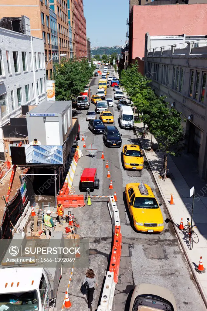 Traffic moves past road construction in New York, USA.
