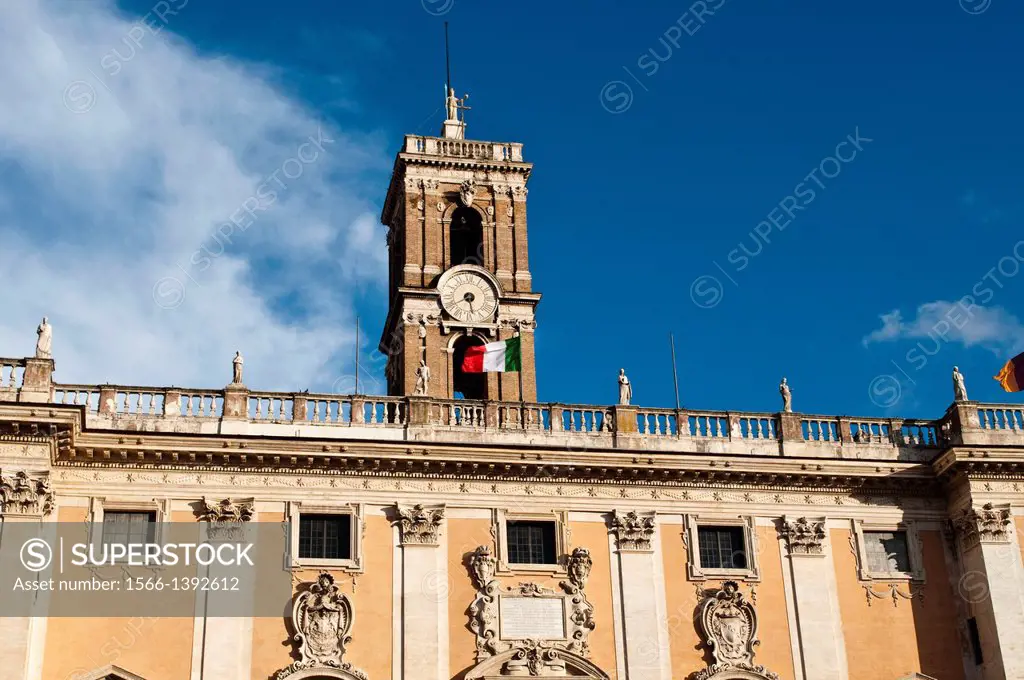 Clock tower with Italian flag, Palazzo Senatorio at Piazza del Campidoglio, Capitoline Hill, Rome, Italy.