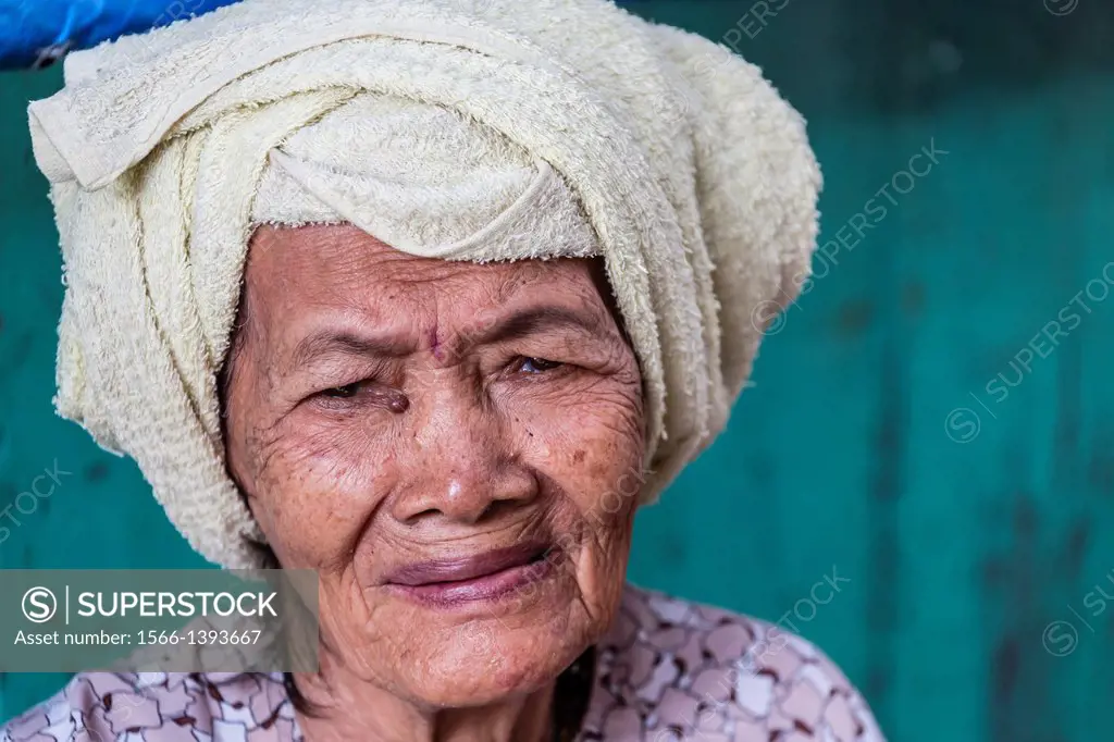 Portrait of Vietnamese woman at the market at Chau Doc, Mekong River Delta, Vietnam.
