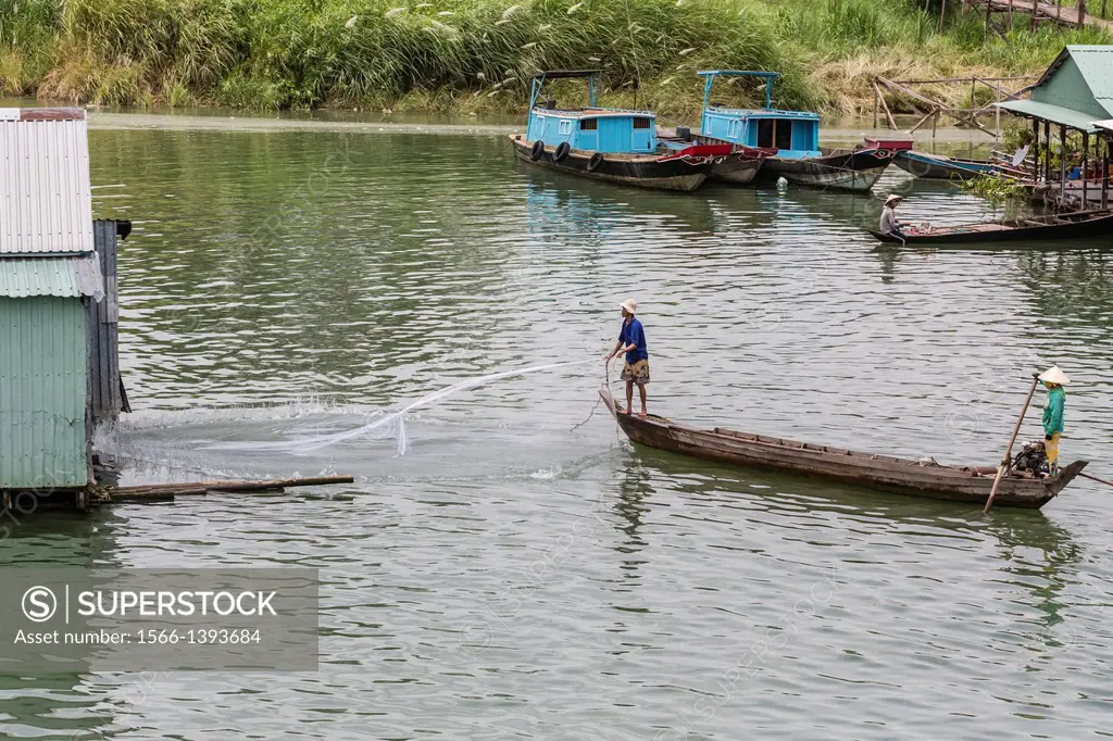 Daily Vietnamese river life on the Tan Chau Canal, Mekong River Delta, Vietnam.