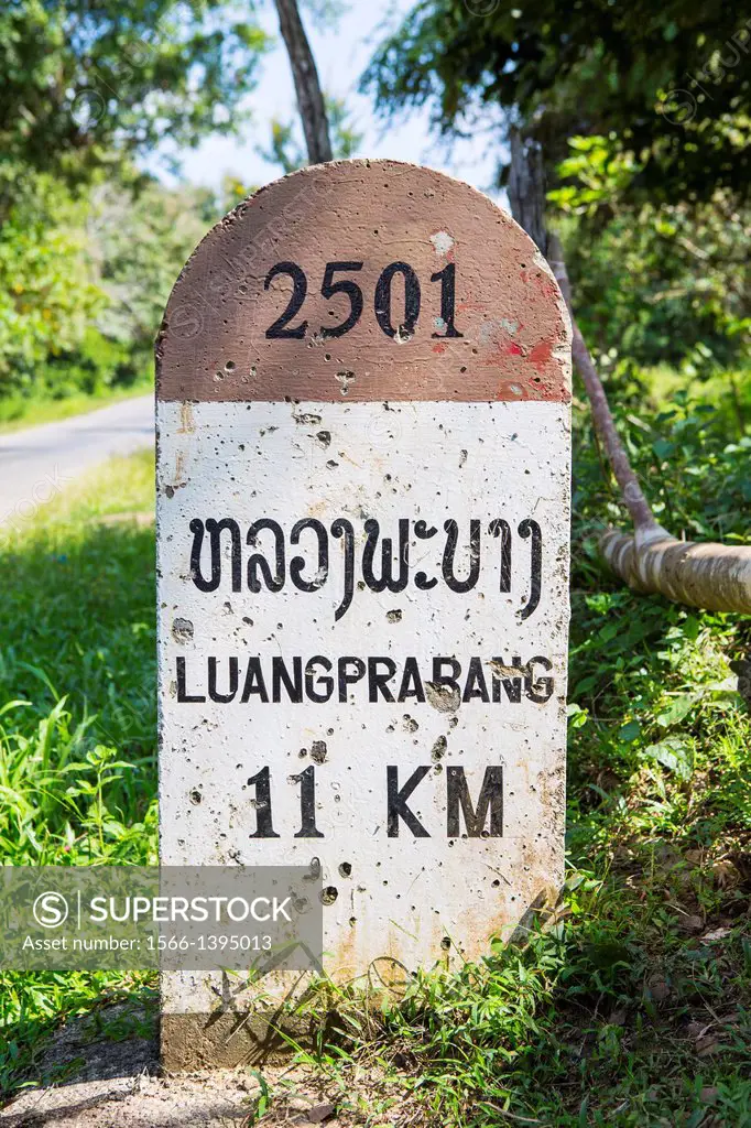 Kilometer Stone on the way to Luang Prabang, Laos.