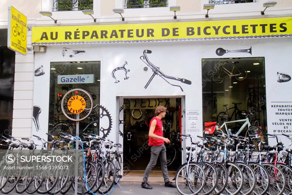 France, Europe, French, Paris, 4th arrondissement, Boulevard de Sébastopol, Au Réparateur de Bicyclettes, bicycle repair shop, display,.
