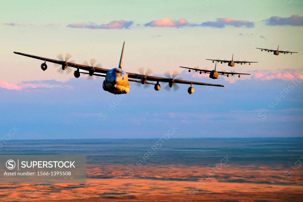 Five MC-130J Commando IIs conduct low-level formation training over Clovis, N.M., Nov. 5, 2013. The New Mexico landscape provides an optimal training ...