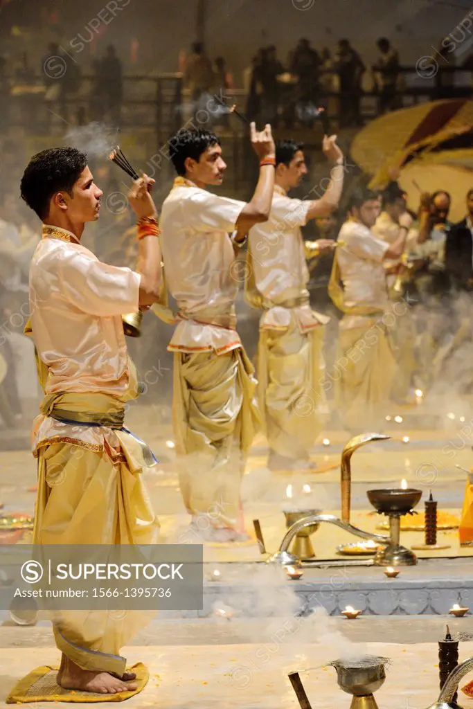 India, Uttar Pradesh, Varanasi, Offering of incense to the Ganges.