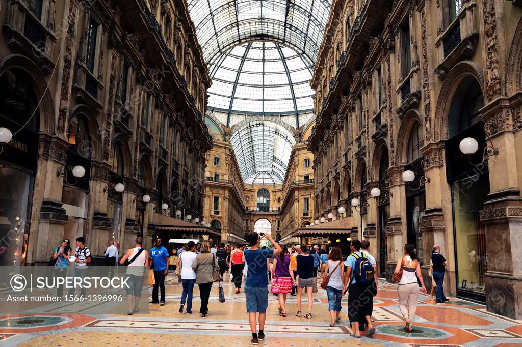 People walking through Galleria Vittorio Emanuele in Milan Italy.