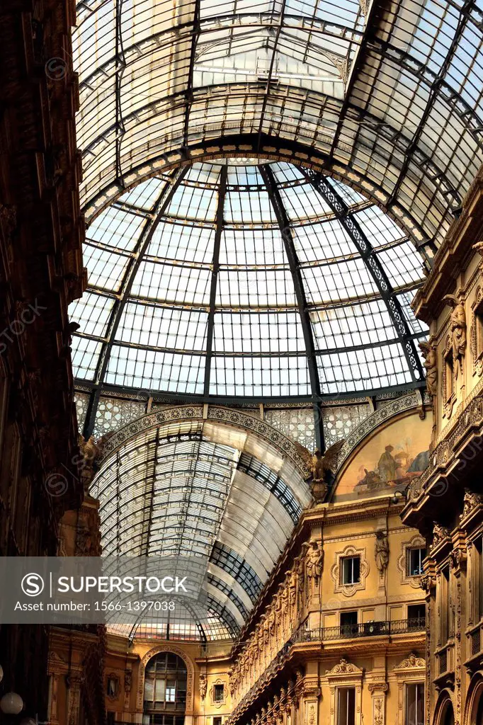 Galleria Vittorio Emanuele is a historic shopping arcade in Milan Italy that features an iron and glass roof.