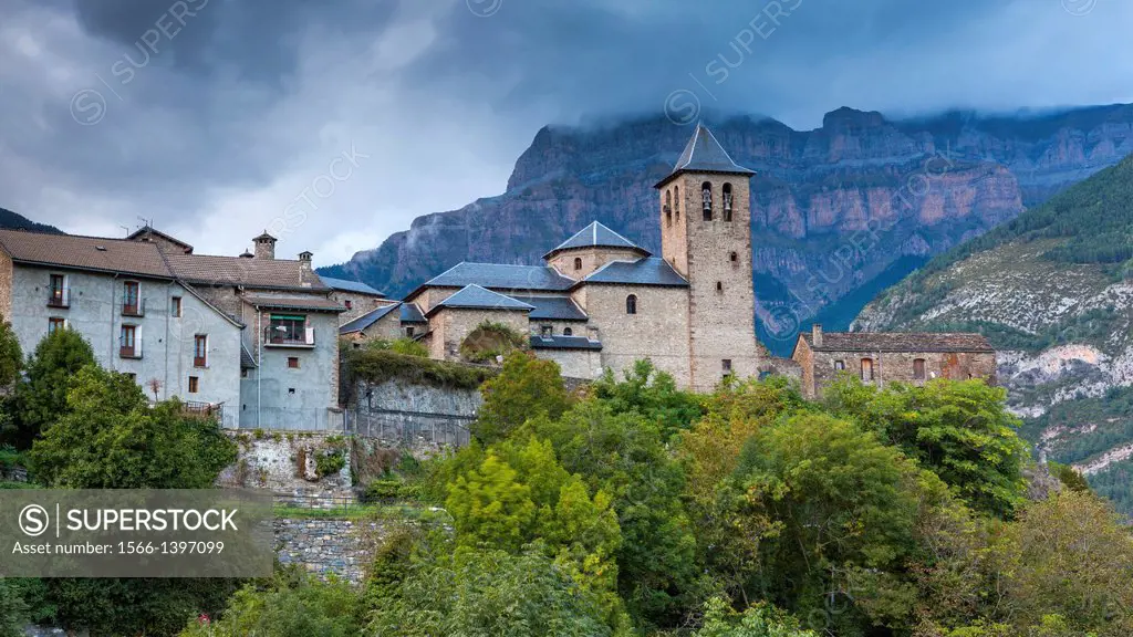 Church of Torla and Pena Mondaruego behind in Parque Nacional de Ordesa y Monte Perdido, Pyrenees, Huesca province, Aragon, Spain, Europe.
