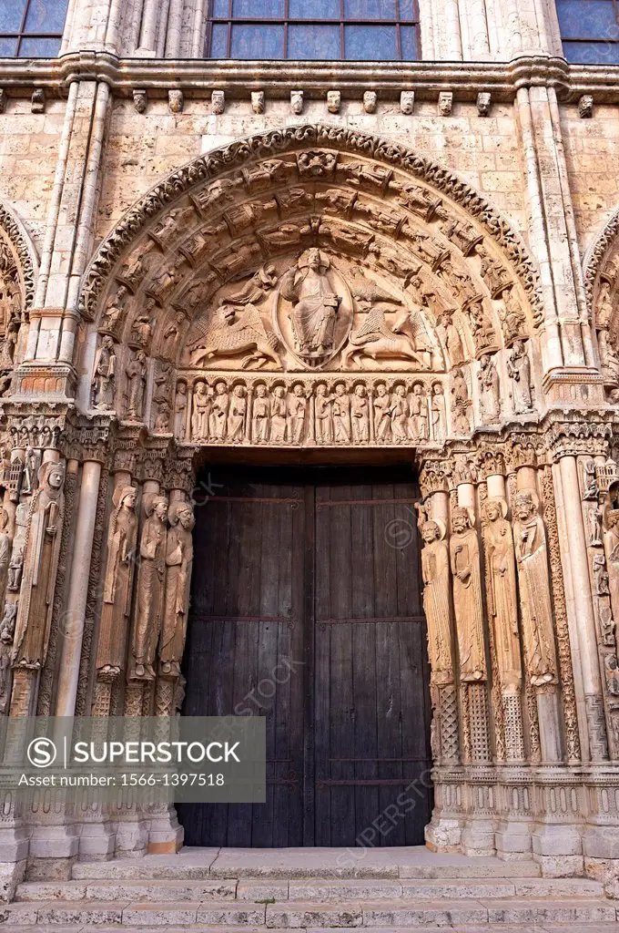 West Facade, Central Portal Tympanum - General View c. 1145. Cathedral of Chartres, France . The tympanum shows gothic sculptures of Christ in Majesty...