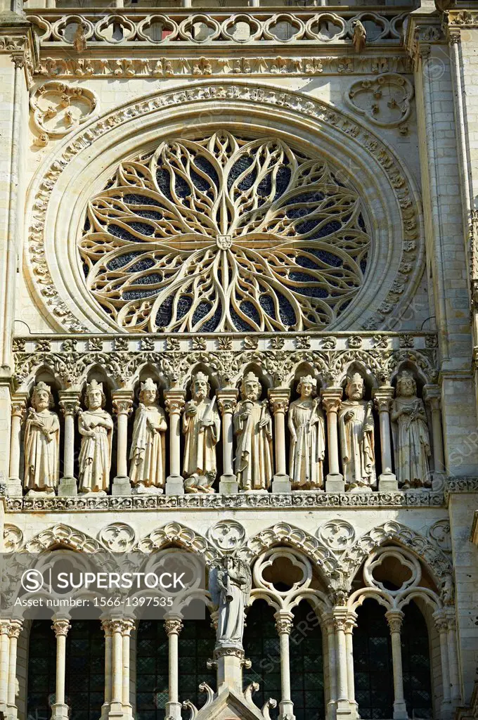 Gothic statues and the facade of the Gothic Cathedral of Notre-Dame, Amiens, France.