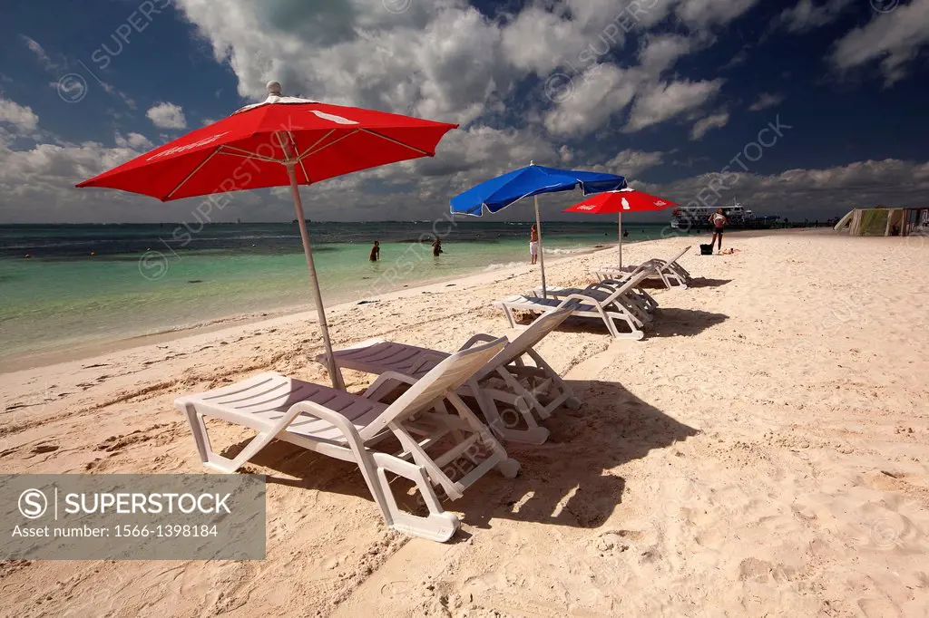 Parasols and sunbeds at the beach, Isla Mujeres, Cancun, Quintana Roo, Yucatan Province, Mexico.