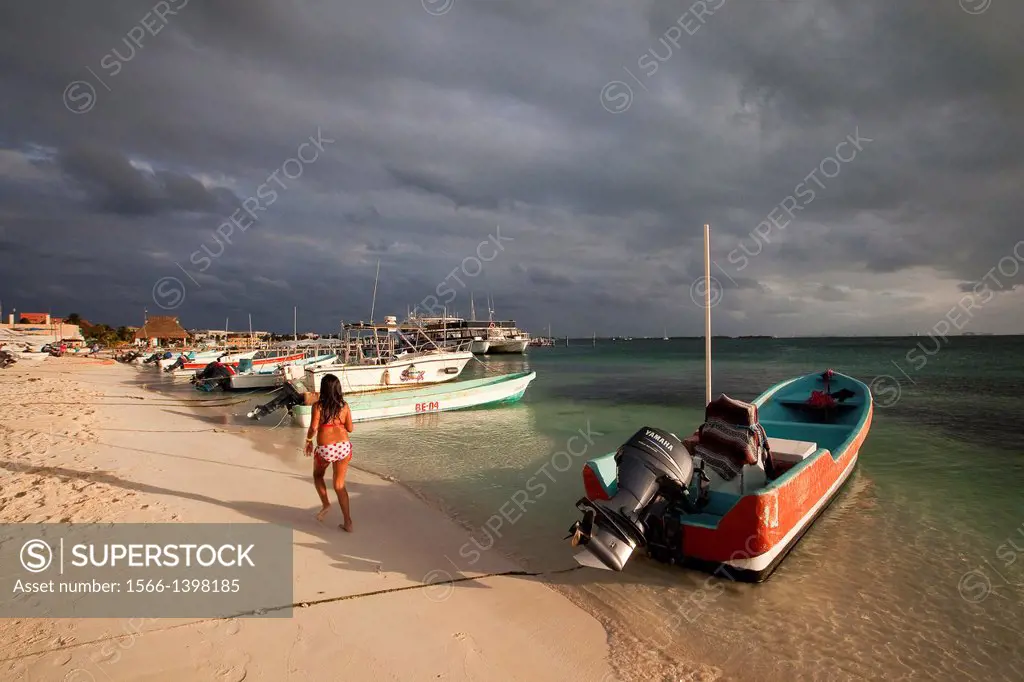 Girl in bikini walking at the beach, Isla Mujeres, Cancun, Quintana Roo, Yucatan Province, Mexico, North America.