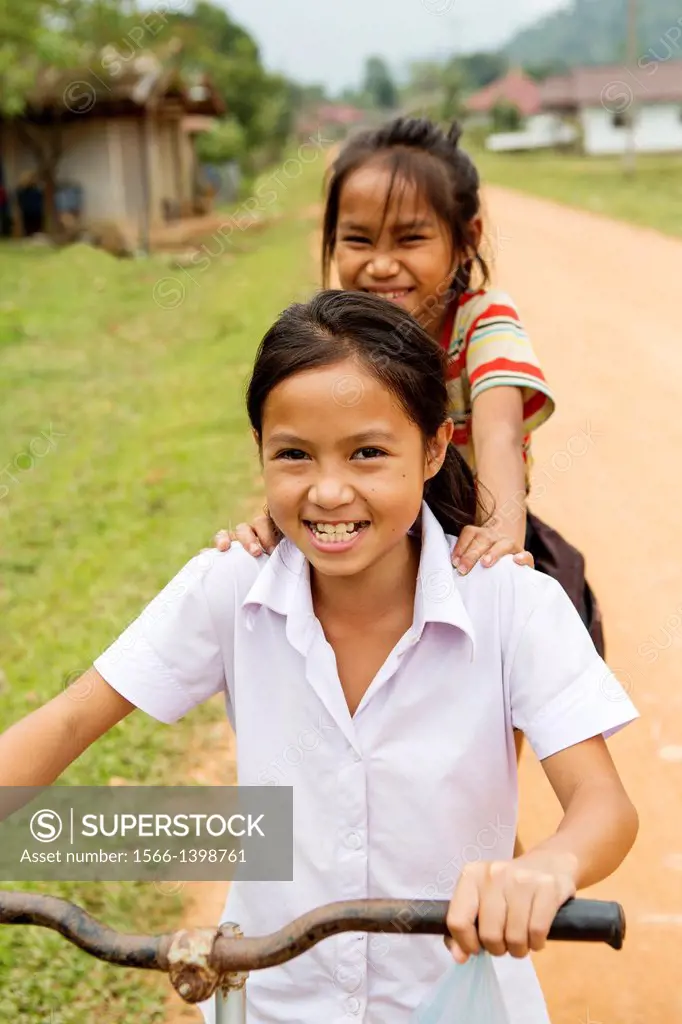 Children returning from school, Vang Vieng, Laos.