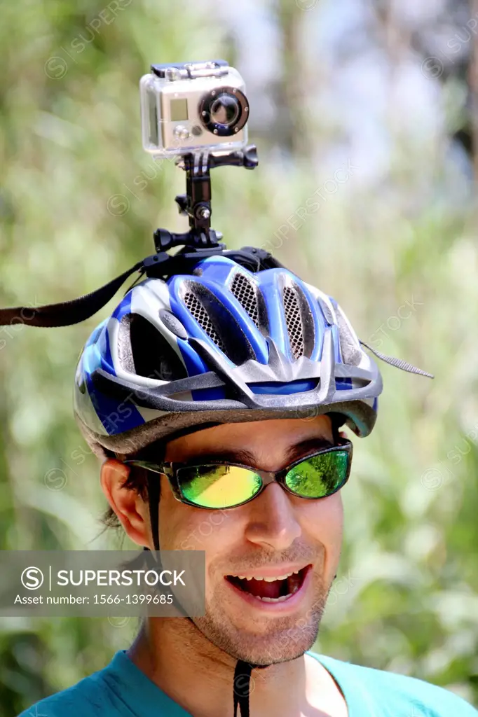 Cyclist recording with Gopro Hero camera fixed on its helmet. Via Verde Girona-St.Feliu de Guixols, Girona province, Catalonia, Spain, Europe