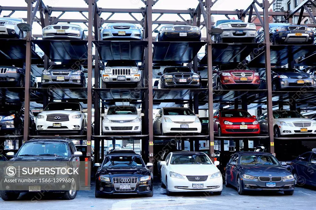 Urban Parking Lot Featuring Many Cars Parked on a Multiple Level Rack, New York City, Manhattan, USA.