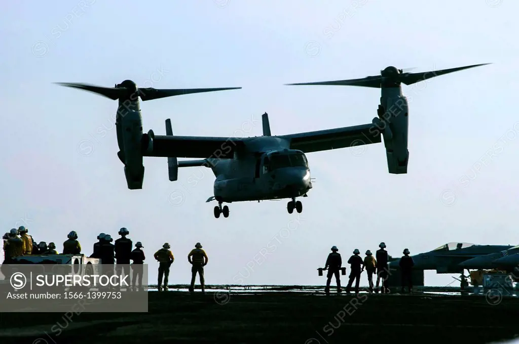GULF OF OMAN (Nov. 23, 2013) An MV-22 Osprey assigned to Marine Medium Tiltrotor Squadron 166 lands aboard the aircraft carrier USS Harry S. Truman (C...