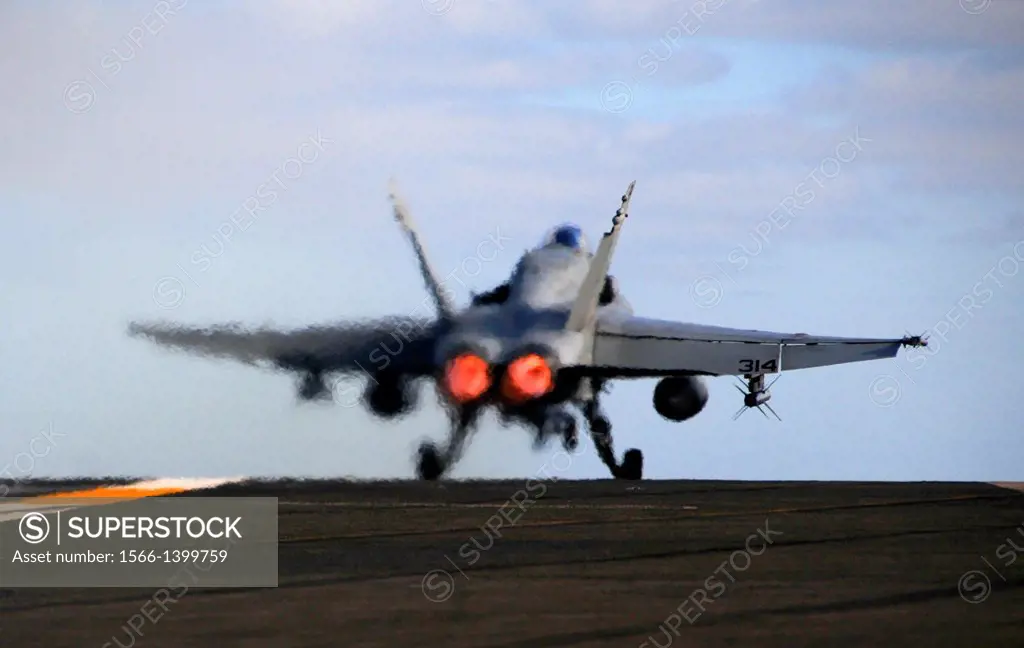 PACIFIC OCEAN (Dec. 10, 2013) An F/A-18C Hornet assigned to the´Blue Diamonds´of Strike Fighter Squadron (VFA) 146 launches off the flight deck of the...