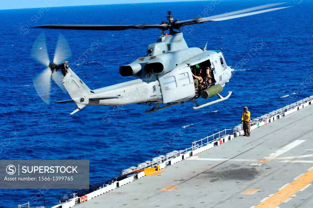 ATLANTIC OCEAN (Aug. 2, 2010) A UH-1Y Huey helicopter takes off from the amphibious assault ship USS Wasp (LHD 1). This transport helicopter, assigned...