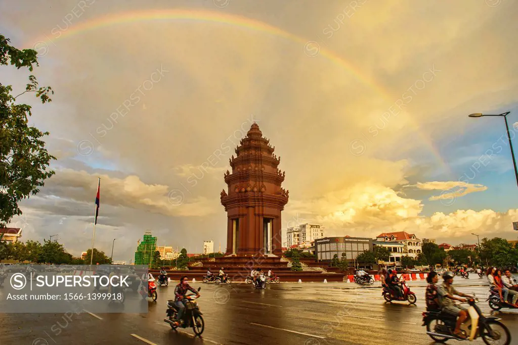 Independence Monument (Vimean Akareach) under a rainbow, Phnom Penh, Cambodia.