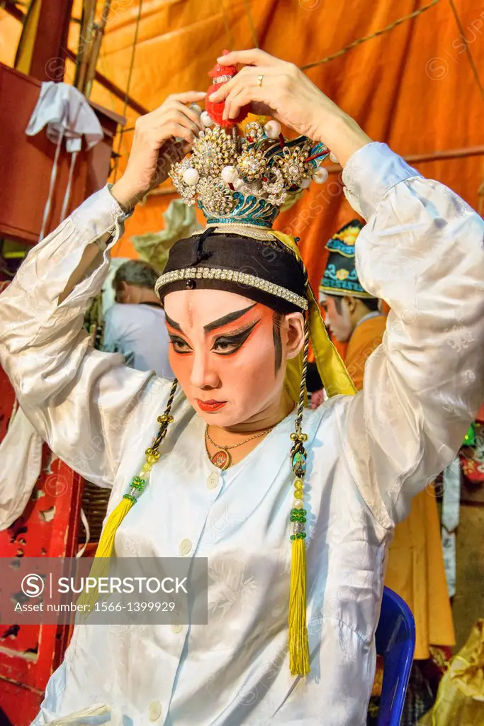 Chinese opera performer prepares for a performance at the Vegetarian Festival in Bangkok, Thailand.
