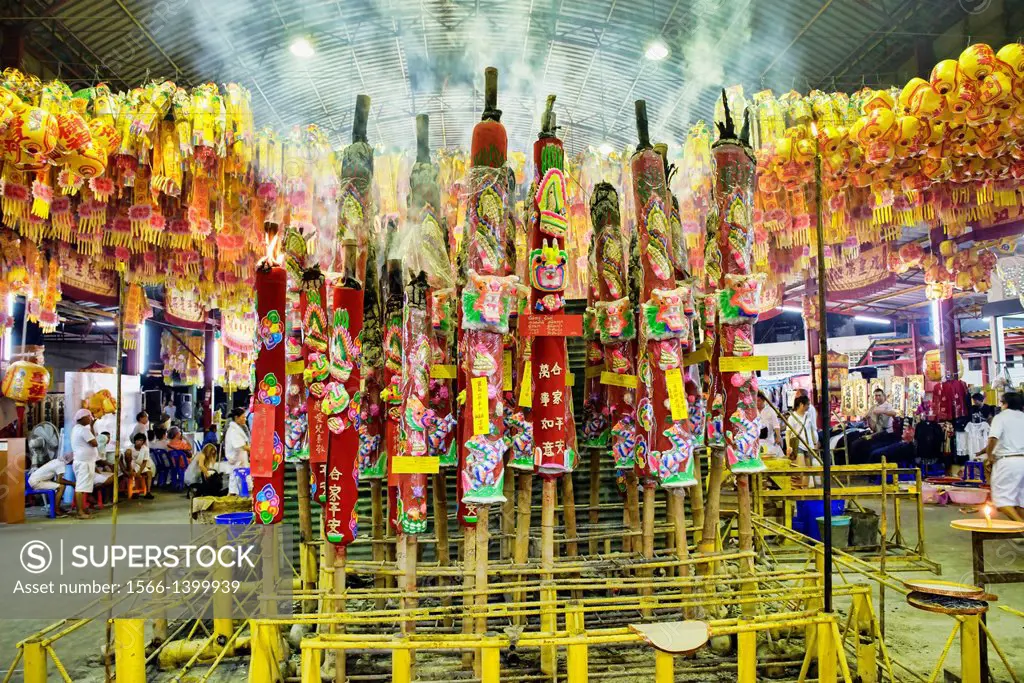 large rocket candles carrying prayers for good luck at the Vegetarian Festival in Bangkok, Thailand.