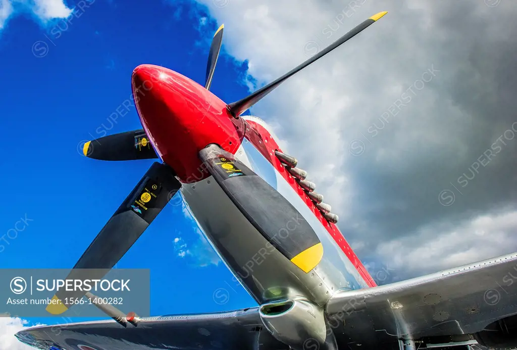 Spitfire Airplane showing bright, dramatic colors and deep blue cloudy sky. Easton Maryland USA