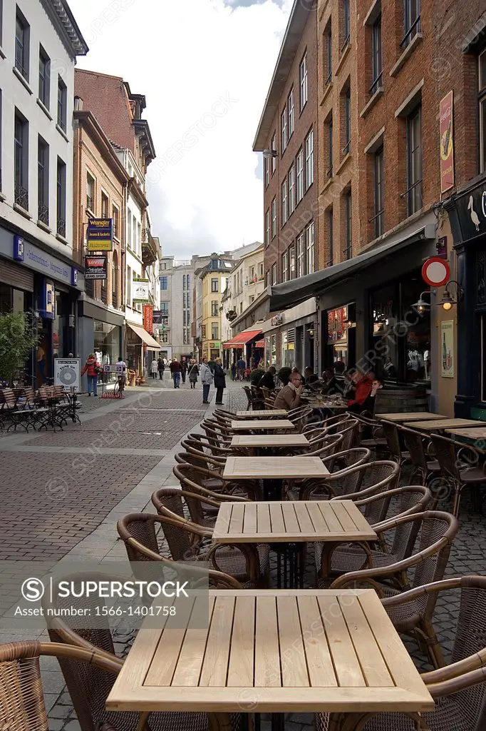 Europe, Belgium, Antwerp. Cafe tables along a street in Antwerp.