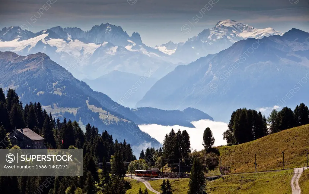 Landscape with Mont Blanc in the background and the railway line Bex-Villars-Bretaye (BVB) is a railway line of 17 km, connecting the station with Bex...