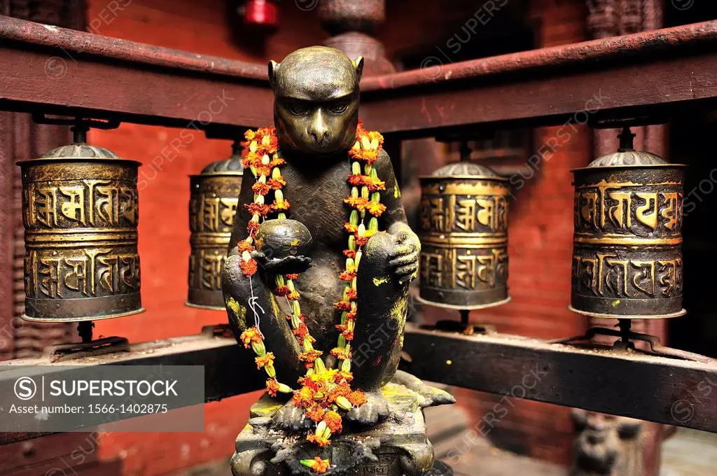 A monkey in bronze at Buddhist Golden Temple or Hiranya Varna Mahavihar, Patan, Nepal
