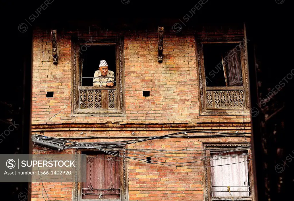 A man at the window, Bhaktapur, Nepal