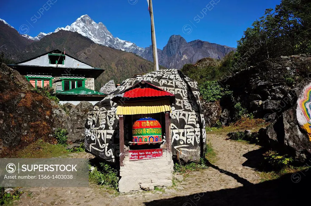 Mani stone and prayer wheel, Sagarmatha National Park, the Himalaya range, Khumbu area, Solukhumbu District, Sagarmatha Zone, Nepal.