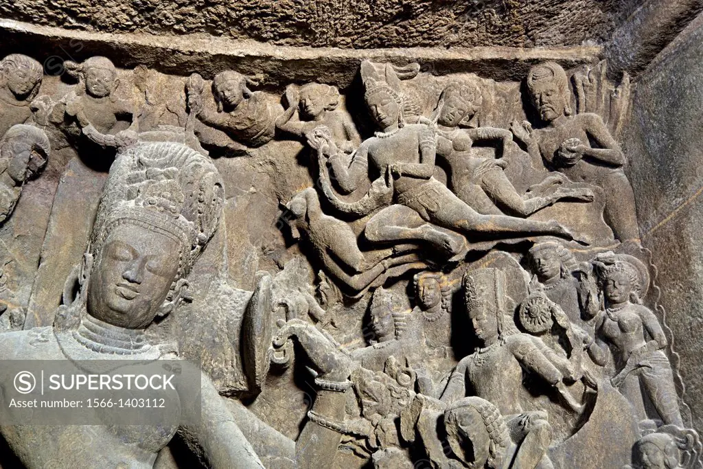 Cave 1 : Elephanta Caves. Right portion of Ardhanarishwar-Gandharvas offering garlands and paying obeisance to the lord. Maharashtra, India.