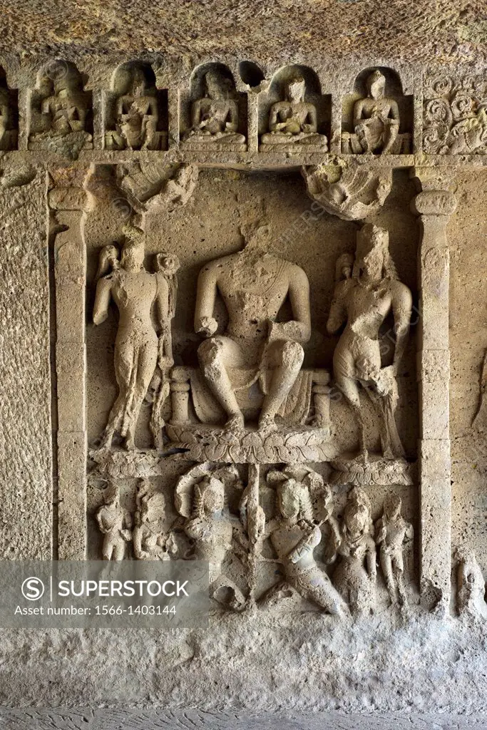 Kondivite rock-cut caves, Mumbai. Chaitya No.9, Buddha panel- Buddha seated in Pralambapadasana with his feet on the Lotus, the Nagas holding the Lotu...