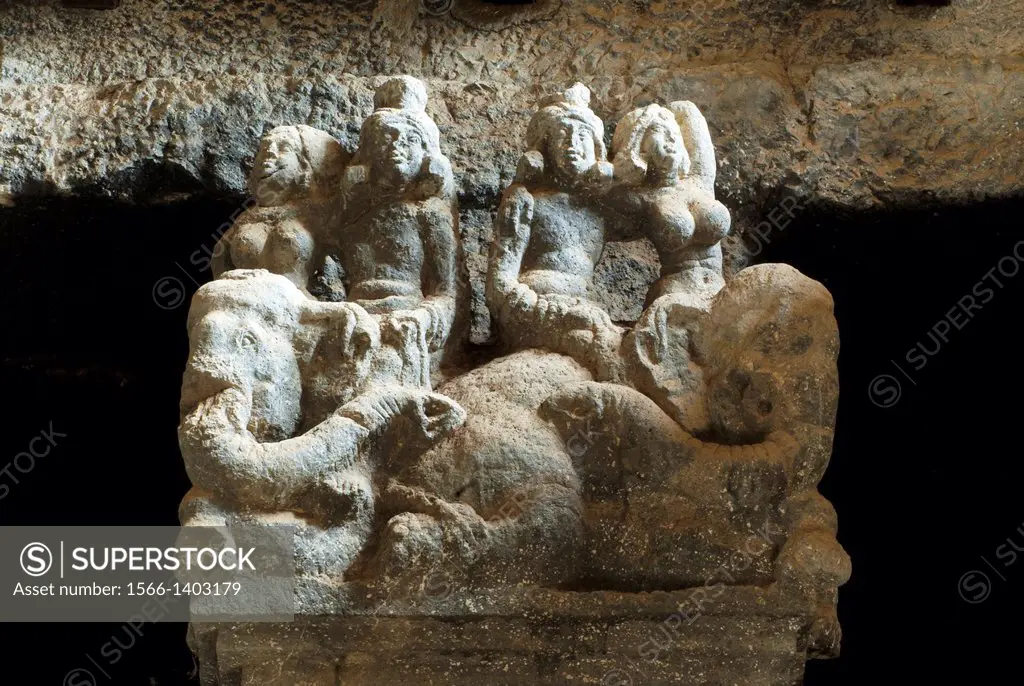 Couple riding elephant on one of the pillar in chaitya hall. Circa 2nd. Century A.D. Karla Caves, Dist Pune, Maharashtra, India.