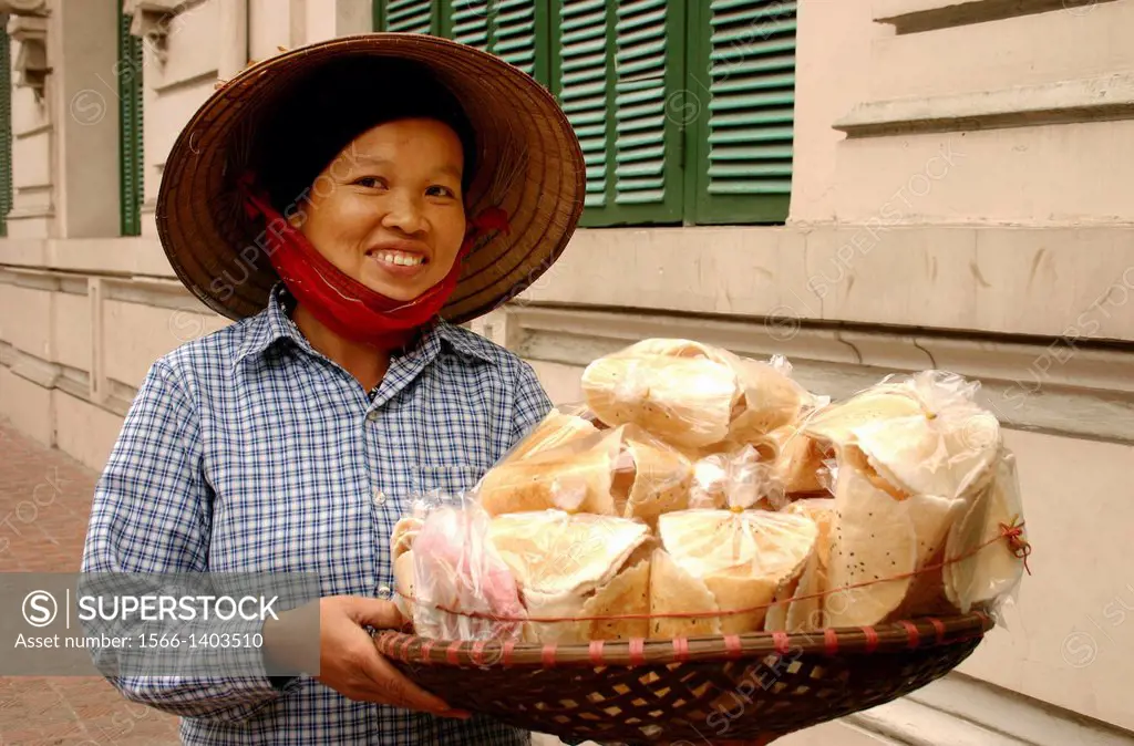 One of the most endearing sights of Hanoi is that of its ubiquitous vendors peddling baskets of crackers, fruit or baguettes through the streets. Whet...