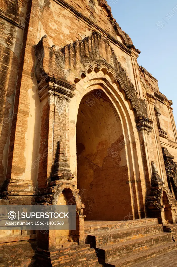 Dhamma Yan Gyi Pahto is a massive walled 12th century temple known by the local Burmese as ""bac luck temple"". The western shrine within the temple c...