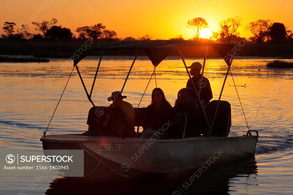 Beautiful sunset over the water safari camp in Eagle Island Camp by Orient Express , outside the Moremi Game Reserve in Botswana. Visit Okavango . The...