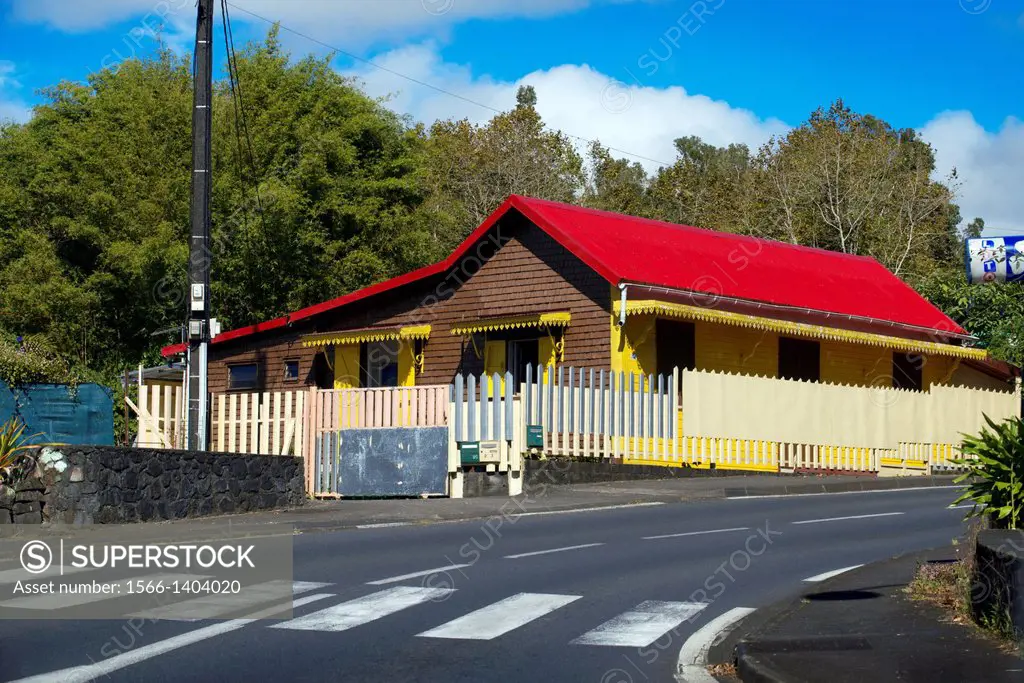 Houses near the road on the N3 road to Piton de la Fournaise. Reunion is a French overseas territory located in the middle of the Indian Ocean, east o...